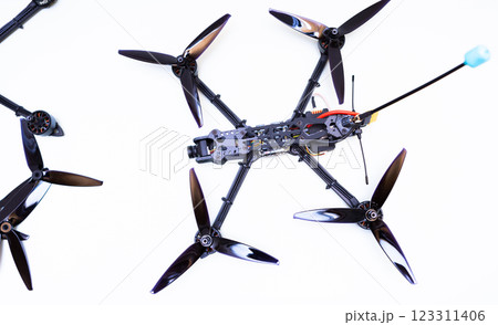 FPV drone in production on white background. 123311406