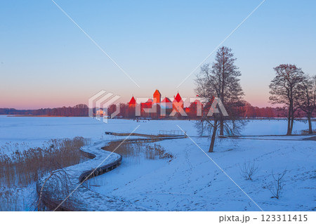 Trakai castle at winter, beautiful medieval castle in the evening light. Lithuania Trakai castle at winter, beautiful medieval castle in the evening light. Lithuania 123311415