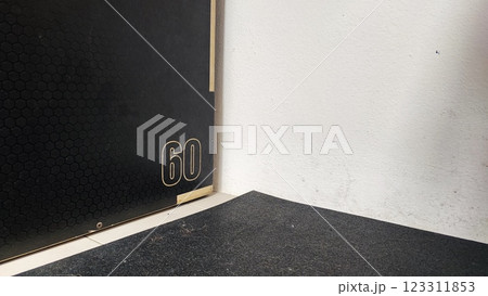 Set of fitness inventory on floor near brick wall. Space for text Set of fitness inventory on floor near brick wall. Space for text 123311853