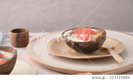 Yogurt with grapefruit, granola, chia and honey Yogurt with grapefruit, granola, chia and honey 123315004