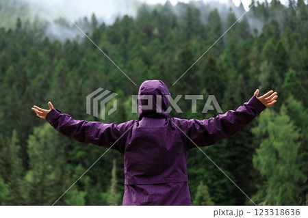 Grateful woman freel free in summer forest 123318636