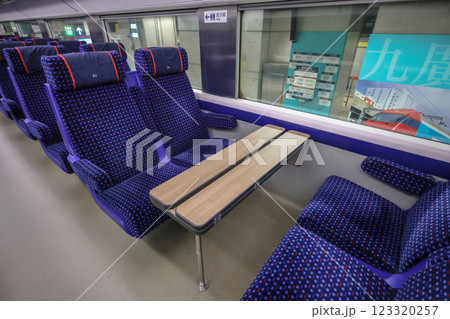 Jan 23 2025 Interior of a Modern Train with Comfortable Seating Arrangement 123320257