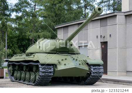 Big green tank at the military base in the city. Big green tank at the military base in the city. 123321244