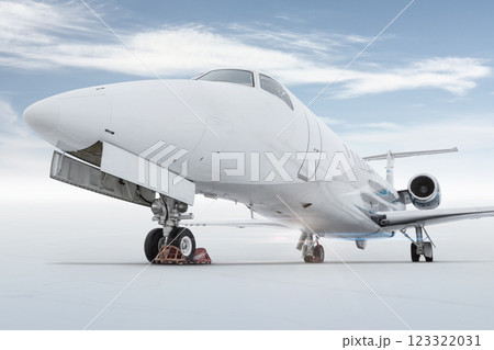 Close-up of a modern private jet isolated on bright background with sky Close-up of a modern private jet isolated on bright background with sky 123322031