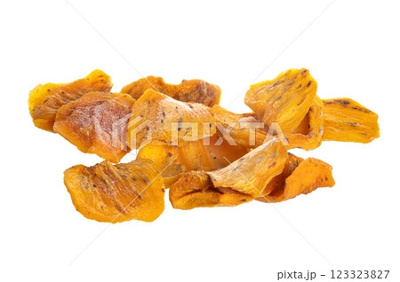 Dried persimmon pieces with a golden color and chewy texture, isolated on a white background. A healthy, tropical snack rich in flavor and nutrients Dried persimmon pieces with a golden color and chewy texture, isolated on a white background. A healthy, tropical snack rich in flavor and nutrients 123323827