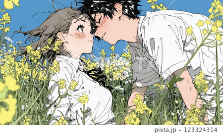 菜の花畑でデートをしている若いカップル