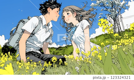 菜の花畑でデートをしている若いカップル