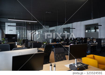 Modern business, glass-walled startup office, open and spacious workspace exudes a modern and innovative vibe, fostering a dynamic atmosphere that supports creativity, collaboration, and business Modern business, glass-walled startup office, open and spacious workspace exudes a modern and innovative vibe, fostering a dynamic atmosphere that supports creativity, collaboration, and business 123324591