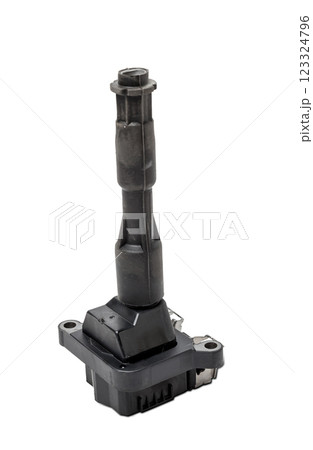 Black ignition coil for engine, isolated on white background. Spare parts for vehicle repair in garage 123324796
