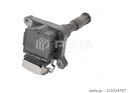 Black ignition coil for engine, isolated on white background. Spare parts for vehicle repair in garage 123324797