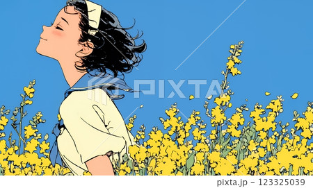 菜の花畑にいる若い女性