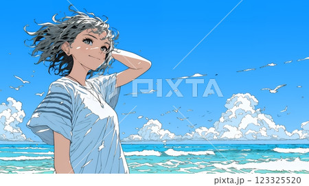 潮風の心地よさを満喫している若い女性