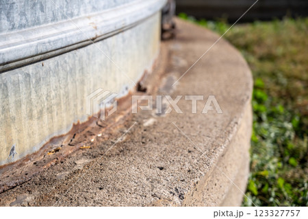 waterproof Joint seam of a flat bottom metal grain storage bin. waterproof Joint seam of a flat bottom metal grain storage bin. 123327757