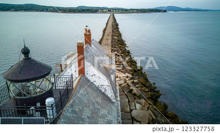 Rockland Breakwater Lighthouse cutting through the harbor on the Gulf of Maine Rockland Breakwater Lighthouse cutting through the harbor on the Gulf of Maine 123327758