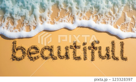 Message written in sand along the shoreline during a sunny day at the beach 123328397