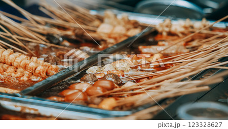 Traditional Chinese Meat Snacks On Bamboo Sticks. Skewered Meat. Chinese Street Food. Street Barbecue. Asian Street Food. Asian Cuisine. Fried Squid, Meat, Potato 123328627
