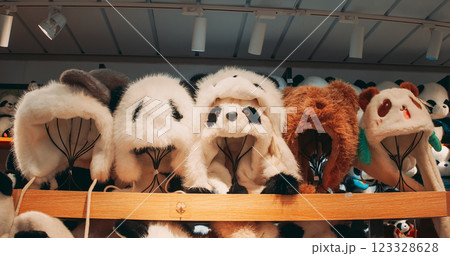 Beijing, China. Souvenir Shop With Panda Hats. National Symbol Of China, Personifying Sincerity, Friendliness, Tolerance And Kindness. Giant Panda Also Panda Bear Or Simply, Is Bear Species Endemic To 123328628
