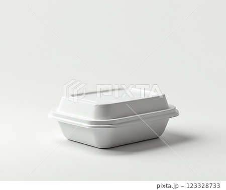 Simple white takeout container showcasing a modern design with clean lines and a compact shape ideal for food storage Simple white takeout container showcasing a modern design with clean lines and a compact shape ideal for food storage 123328733