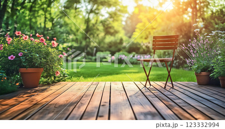 Beautiful garden with seating and lush greenery, captured from the perspective of wood large patio area 123332994