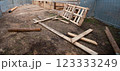 Wood house demolition or disaster with wooden boards 123333249