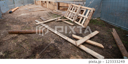 Wood house demolition or disaster with wooden boards Wood house demolition or disaster with wooden boards 123333249