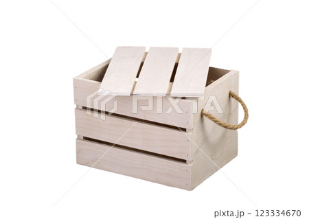 Wooden box with a lid on a white background. Storage box 123334670