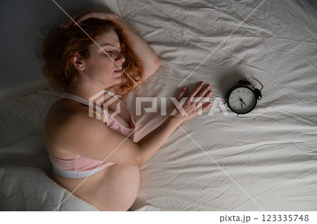 Pregnant woman suffers from insomnia. Pregnant woman suffers from insomnia. 123335748