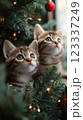 Curious kittens explore a festive holiday atmosphere. Generative AI 123337249