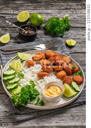 crunchy breaded salmon fish nuggets with rice 123338632