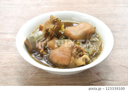 boiled braised salty pork leg and chop cabbage in Chinese herb soup in bowl boiled braised salty pork leg and chop cabbage in Chinese herb soup in bowl 123339100