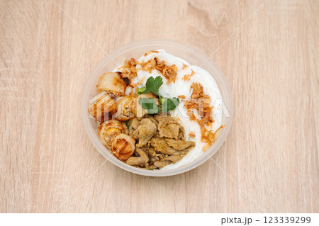 Bo Bun in plastic takeout container on wooden background. International cuisine 123339299