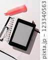 Tablet Screen With Important Ideas On It And Note Sticked On It On Desk With Notebook And Marker. 123340563