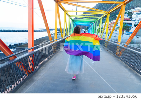 Woman holding lgbt flag Woman holding lgbt flag 123341056