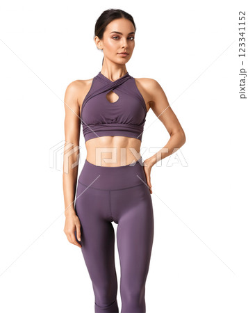 luxurious dark purple yoga top with a built-in bra and an open back design with a knot detail. The stretchy 123341152