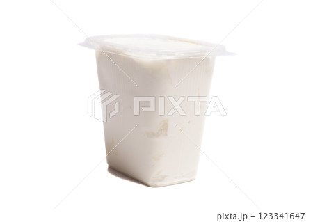 Plastic container with sour cream isolated on white 123341647