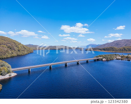 The Bradshaw Bridge and Lake Burbury in Tasmania Australia The Bradshaw Bridge and Lake Burbury in Tasmania Australia 123342380