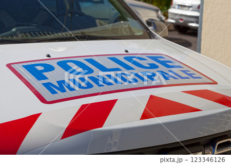 French municipal police sign on the hood of a car 123346126