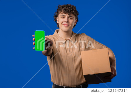Happy man, online shopping consumer received cardboard order parcel box,purchase 123347814