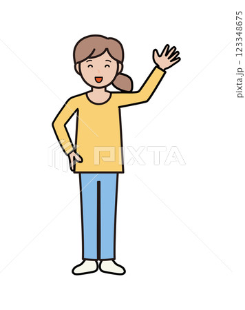 元気に挨拶をするパンツルックの若い女性の全身イラスト 123348675
