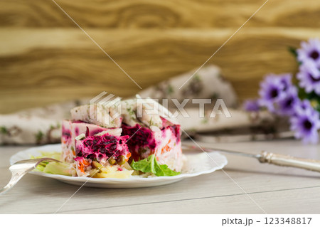 Homemade vegetable salad with potatoes, carrots and fish Homemade vegetable salad with potatoes, carrots and fish 123348817