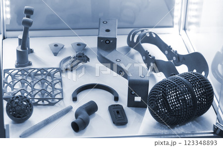 Complex multi-part models printed on 3D printer from grey polyamide powder. Detailed prototype created on 3D printer from plastic powder. 3D printing powder technology. Multi Jet Fusion MJF technology 123348893