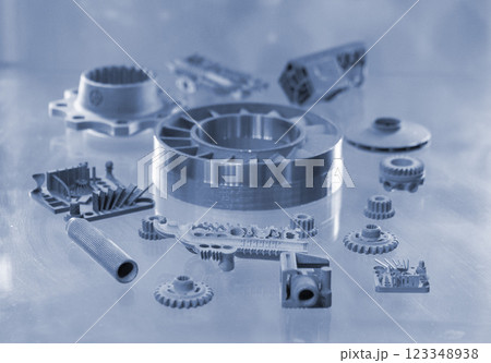 Object printed on 3D printer from metal powder using Metal Jet technology. High detailed detailing parts. Metal Jet. 3D-printed metal parts. Modern 3D printing, additive manufacturing technologies 123348938