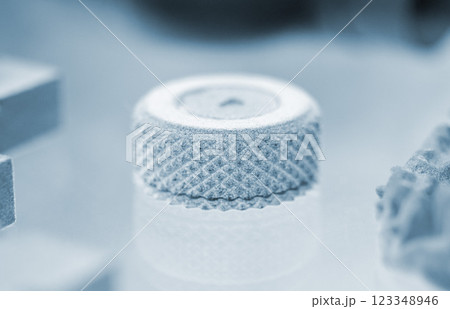Model printed on 3D printer from grey polyamide powder close-up. Detailed prototype created on 3D printer from plastic powder. 3D printing additive powder technology, Multi Jet Fusion MJF technology 123348946