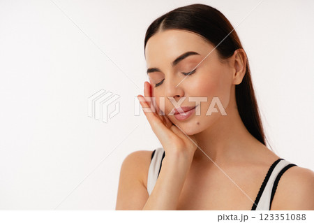 Relaxed Individual With Eyes Closed Enjoying a Peaceful Moment 123351088