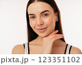 Bright Smiling Woman Posing with Clear Skin and Natural Charm 123351102