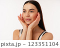 Portrait of Hands Touching Face on Isolated White Background 123351104