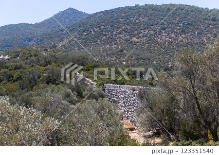 Summer landscape with the Ancient Roman Delikkemer aqueduct bridge 123351540