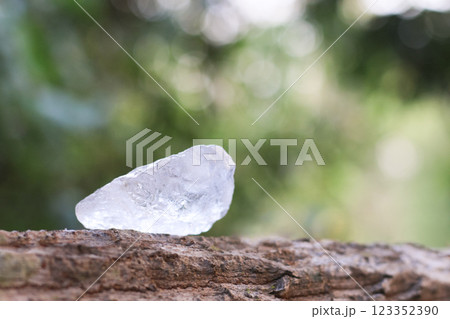 Crystal clear alum cubes or Potassium alum in on rough surface chemical compound substance concept for beauty spa and underarm treatment industrial Crystal clear alum cubes or Potassium alum in on rough surface chemical compound substance concept for beauty spa and underarm treatment industrial 123352390