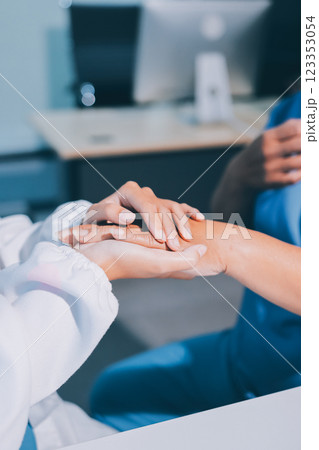 Closeup, doctor holding hands with senior woman and cancer care or support. Healthcare or trust, empathy or compassion and female caregiver or nurse holding elderly person hand for hope and kindness Closeup, doctor holding hands with senior woman and cancer care or support. Healthcare or trust, empathy or compassion and female caregiver or nurse holding elderly person hand for hope and kindness 123353054