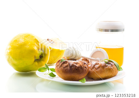 Pastries. Sweet buns with quince and honey filling Pastries. Sweet buns with quince and honey filling 123353218